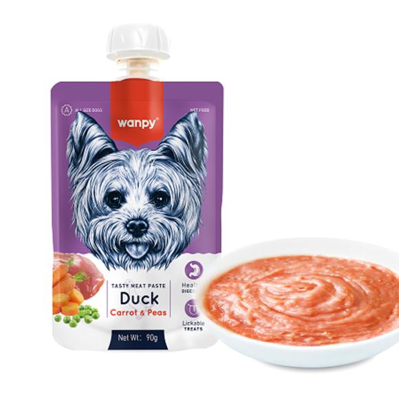 Wanpy kødpaté til hunde med and, gulerod og ærter, 90g. Pakke og skål med paté vises.
